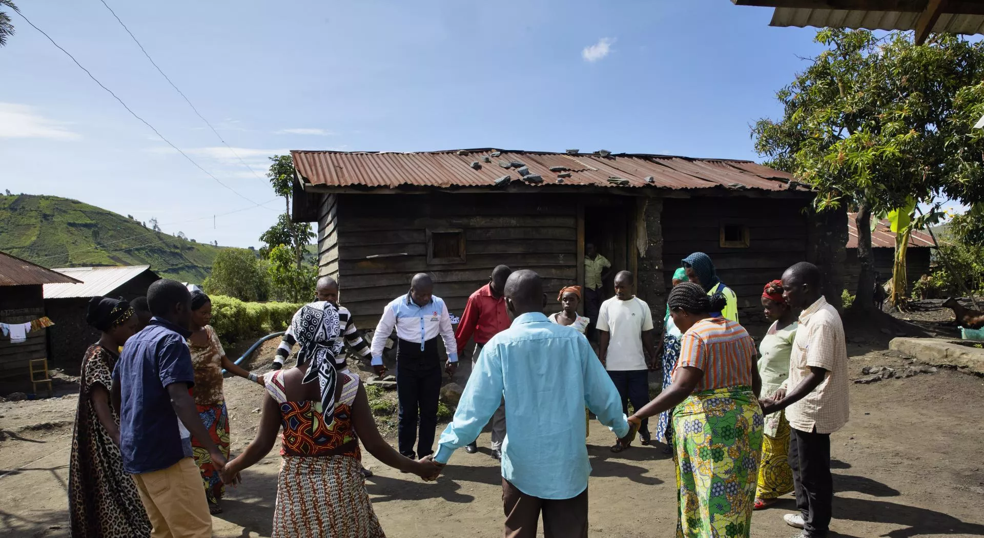 People in DR Congo gather in small groups to promote peace and reconciliation